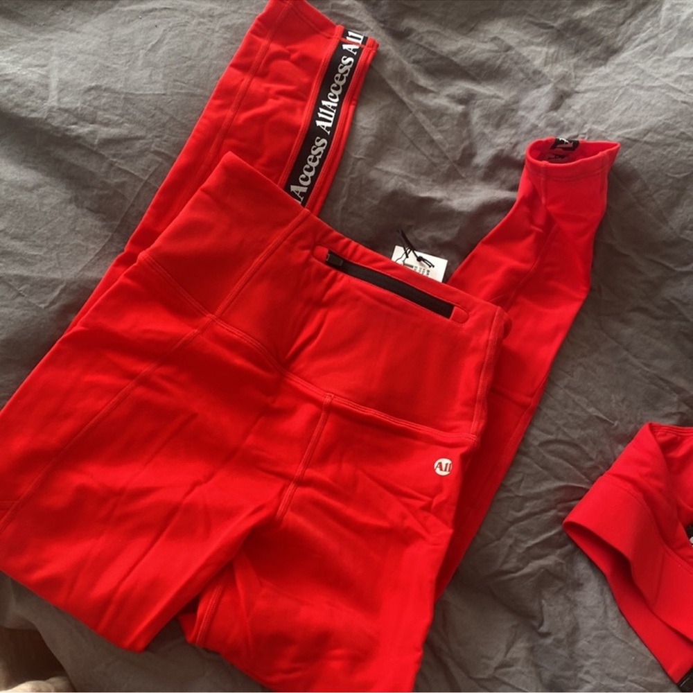 NWT ALL ACCESS RED LEGGINGS WITH BLACK LOGO